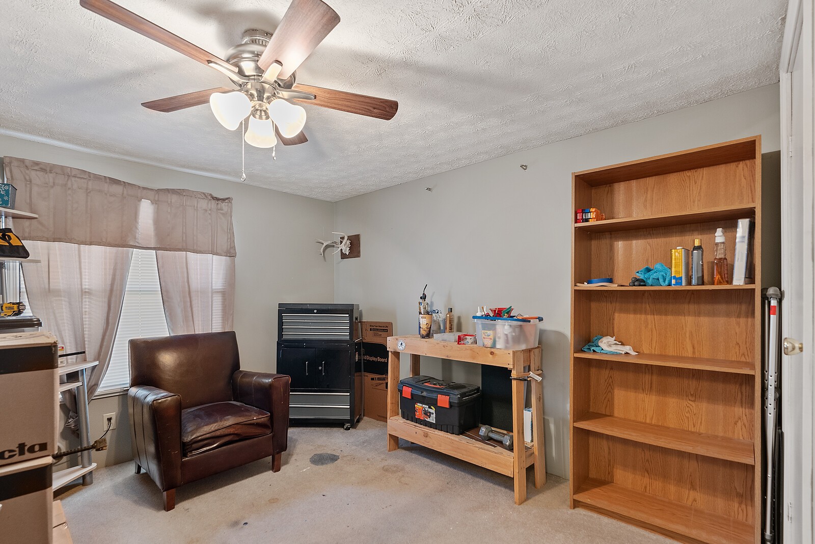 6480 Highway 161 Springfield, TN 37172 - Photo 12 of 20 a living room with furniture and a flat screen tv