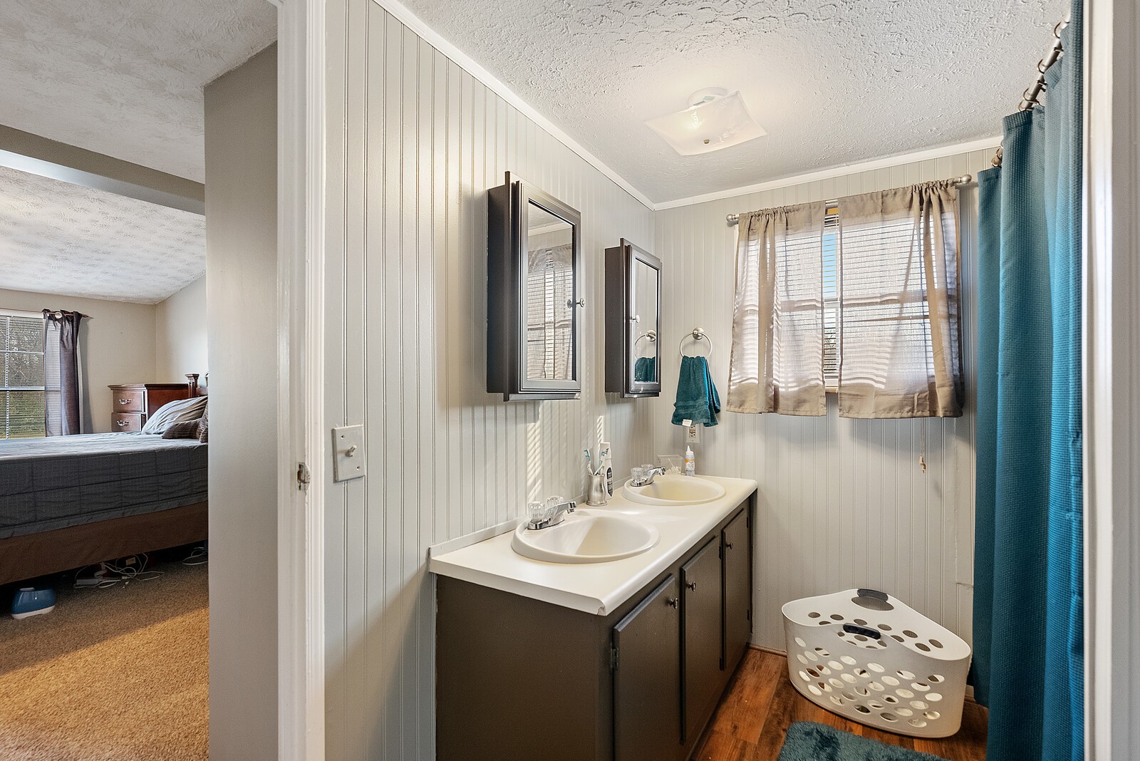 6480 Highway 161 Springfield, TN 37172 - Photo 16 of 20 a bathroom with a sink a toilet and mirror