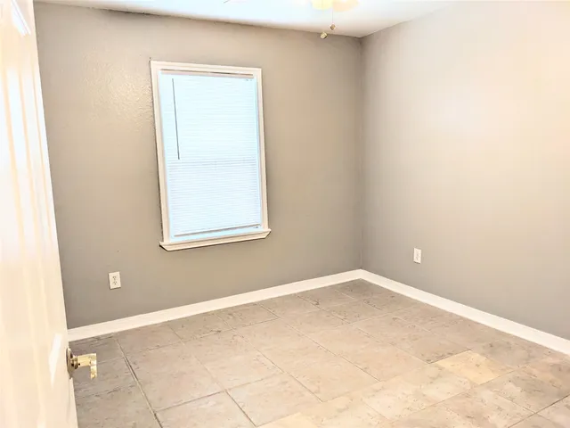 an empty room with a workbench