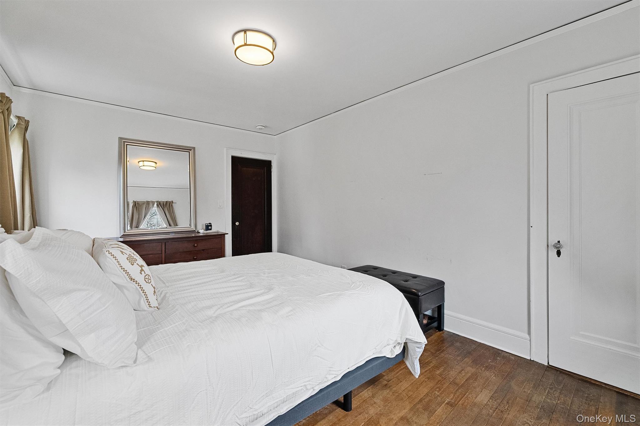 112 Ralph Avenue White Plains, NY 10606 - Photo 24 of 30 Bedroom featuring hardwood / wood-style floors and baseboards