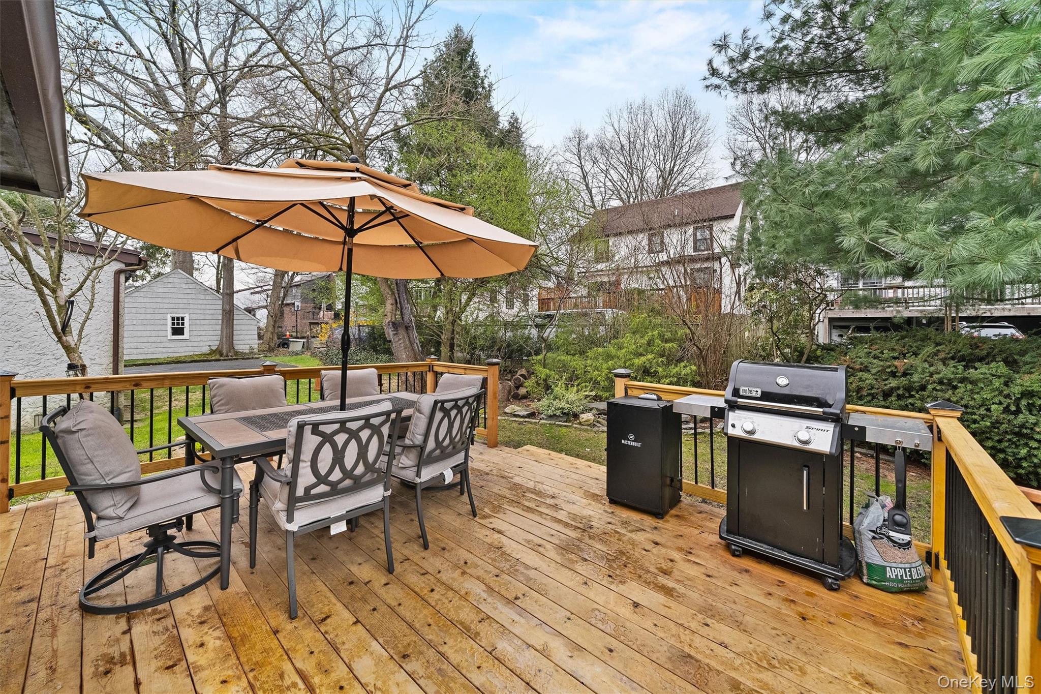 112 Ralph Avenue White Plains, NY 10606 - Photo 27 of 30 Wooden deck featuring grilling area and outdoor dining space