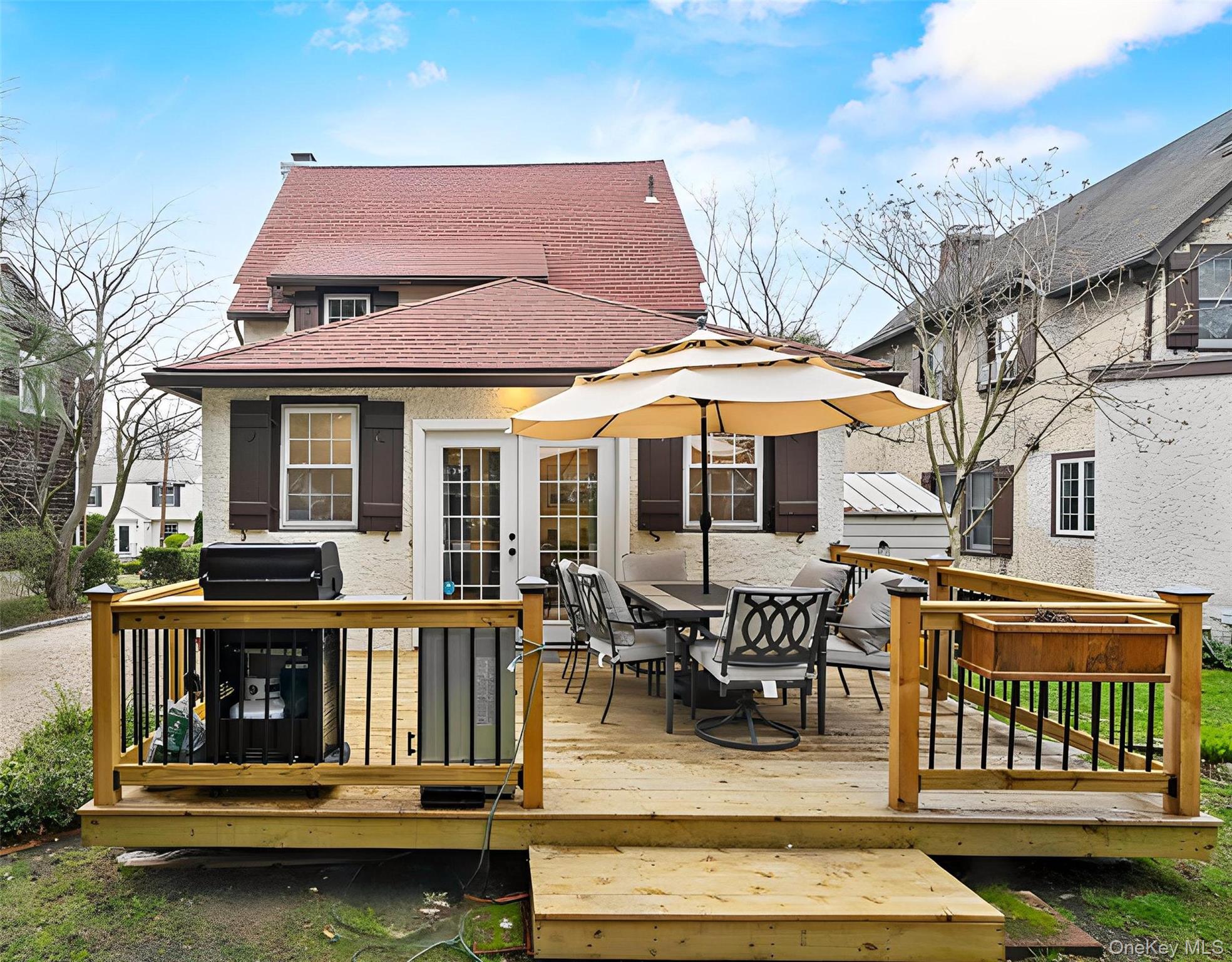 112 Ralph Avenue White Plains, NY 10606 - Photo 29 of 30 Wooden deck featuring french doors and outdoor dining area