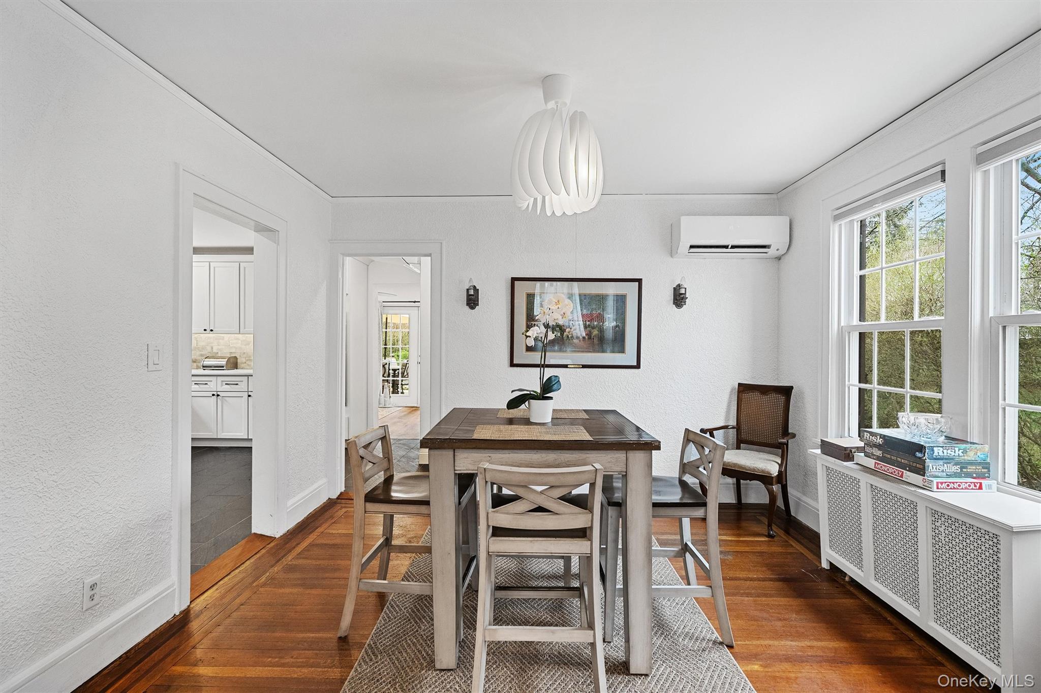 112 Ralph Avenue White Plains, NY 10606 - Photo 9 of 30 Dining space featuring plenty of natural light, dark wood-type flooring.