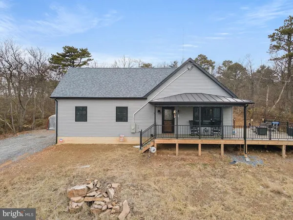 a house view with a garden space