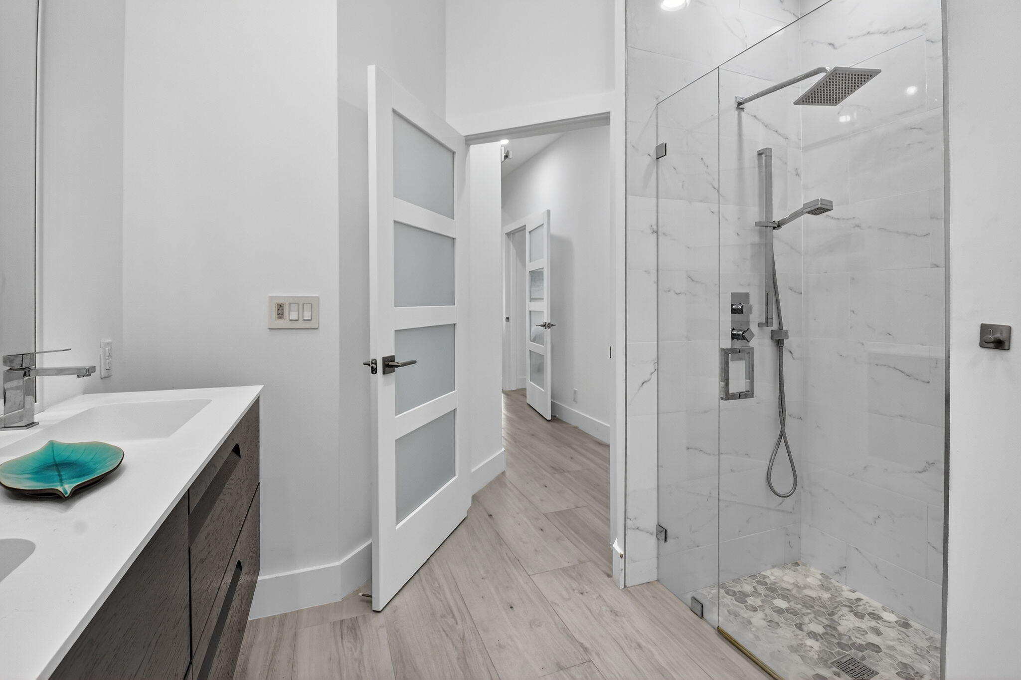 6668 Northwest 25th Terrace Boca Raton, FL 33496 - Photo 22 of 53 a bathroom with a shower and a sink