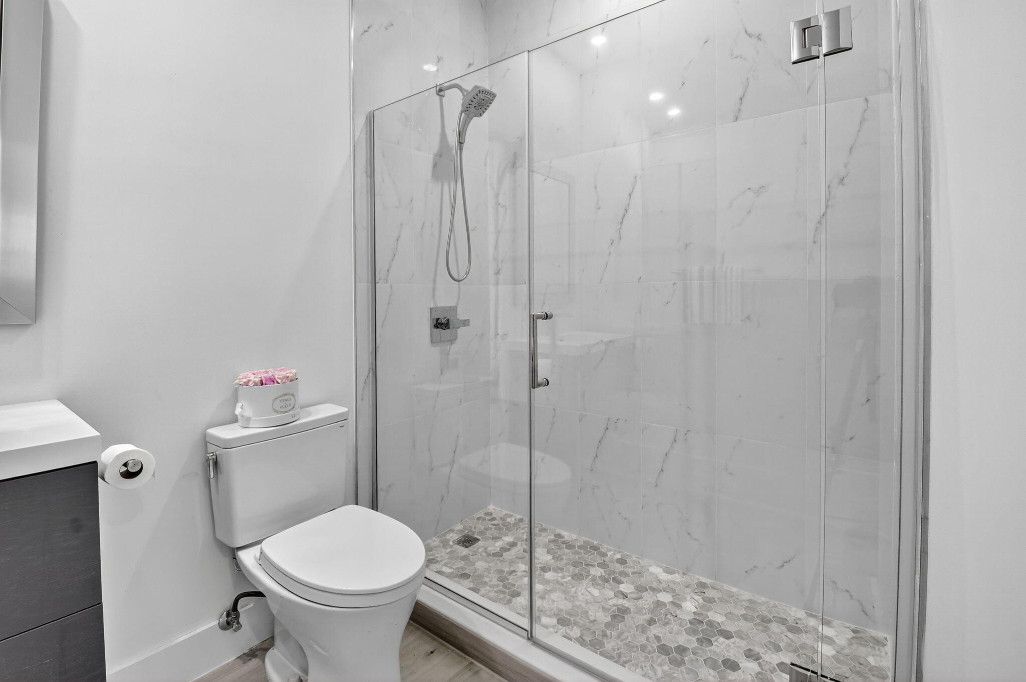 6668 Northwest 25th Terrace Boca Raton, FL 33496 - Photo 33 of 53 a bathroom with a toilet and a shower