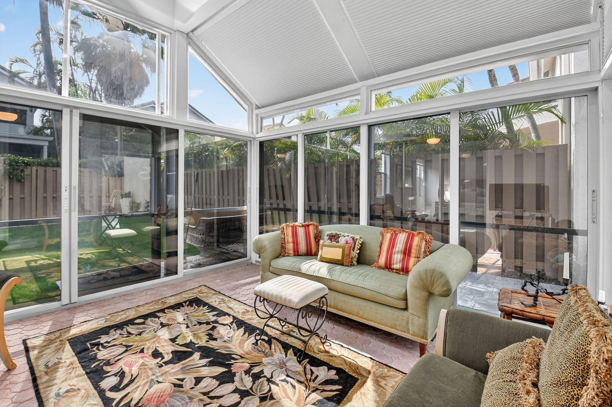 6668 Northwest 25th Terrace Boca Raton, FL 33496 - Photo 34 of 53 a living room with furniture tv and a large window