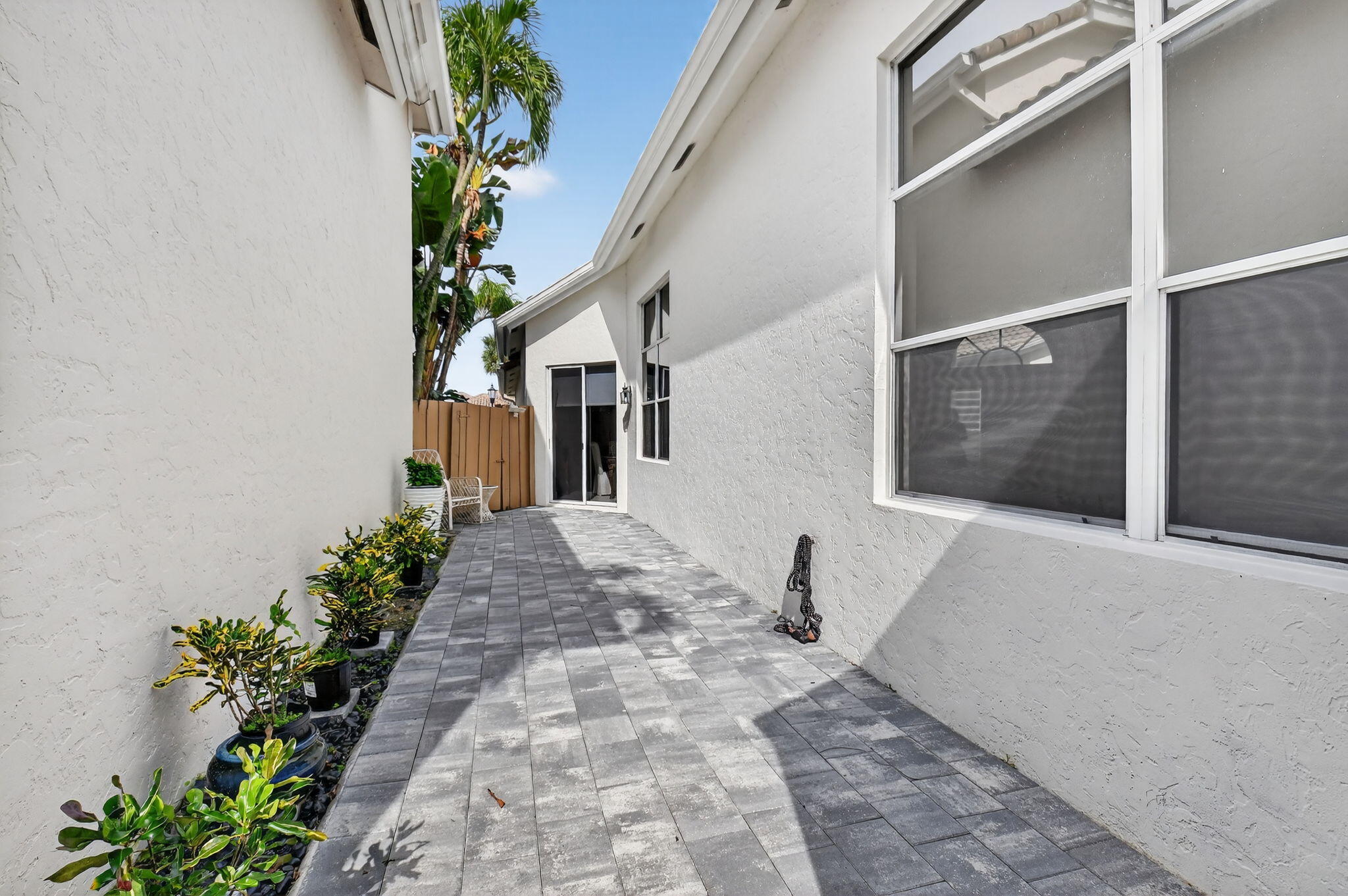 6668 Northwest 25th Terrace Boca Raton, FL 33496 - Photo 38 of 53 a view of a back yard of the house