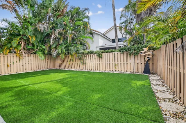 a view of a backyard with a garden