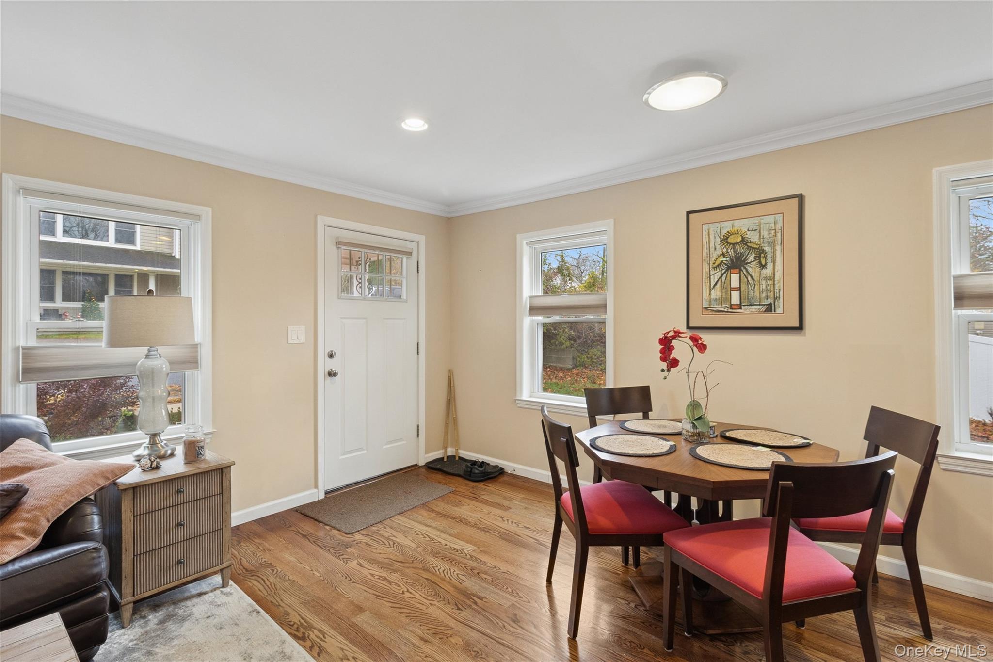 31 Amityville Road Sound Beach, NY 11789 - Photo 13 of 33 a view of a dining room with furniture window and wooden floor