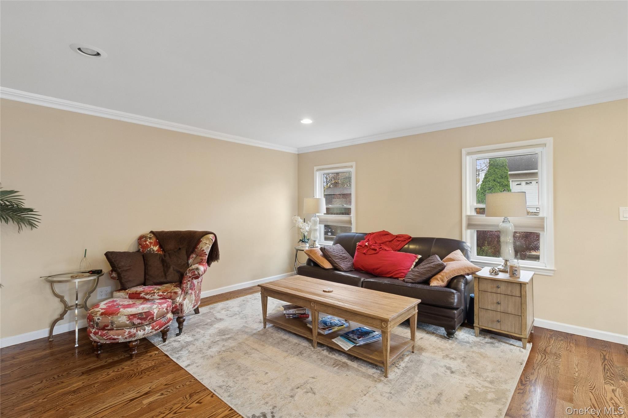 31 Amityville Road Sound Beach, NY 11789 - Photo 14 of 33 a living room with furniture and wooden floor