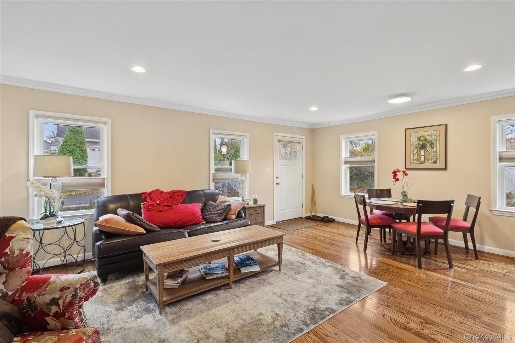 31 Amityville Road Sound Beach, NY 11789 - Photo 15 of 33 a living room with furniture and wooden floor