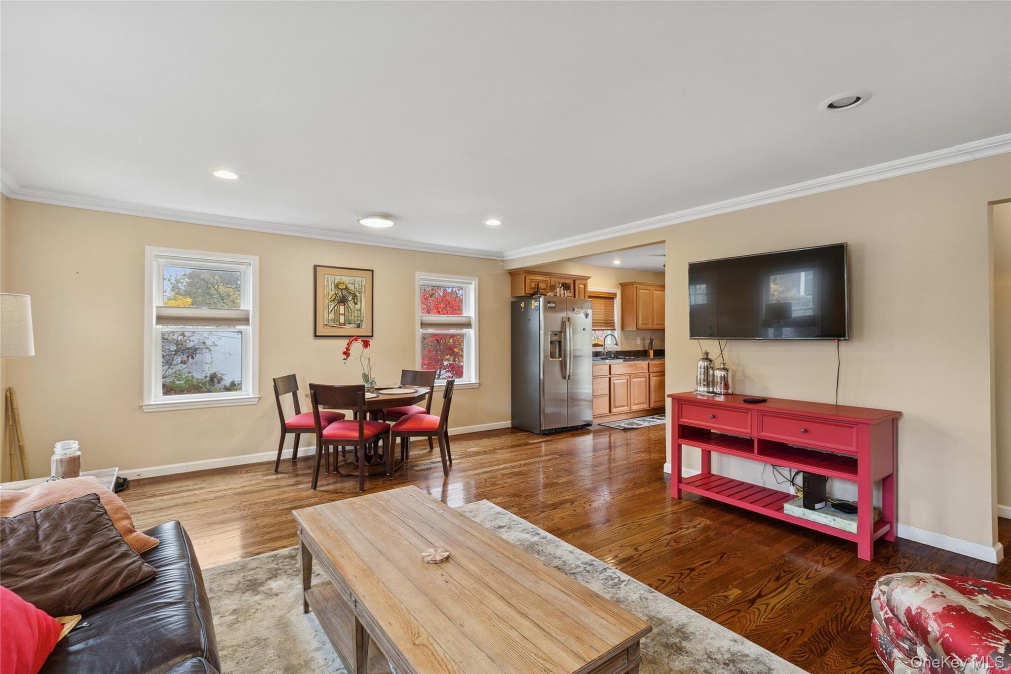 31 Amityville Road Sound Beach, NY 11789 - Photo 17 of 33 a living room with furniture and a flat screen tv