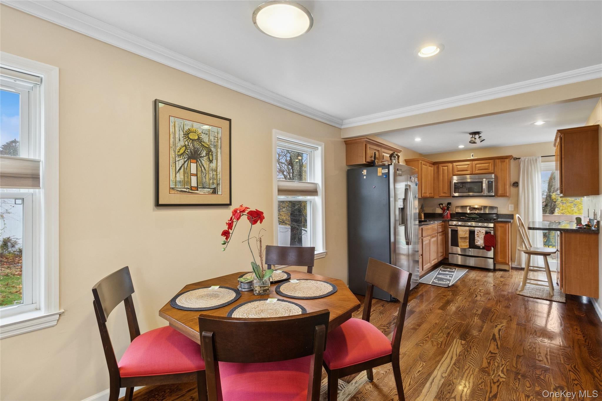 31 Amityville Road Sound Beach, NY 11789 - Photo 19 of 33 a view of a dining room with furniture and wooden floor