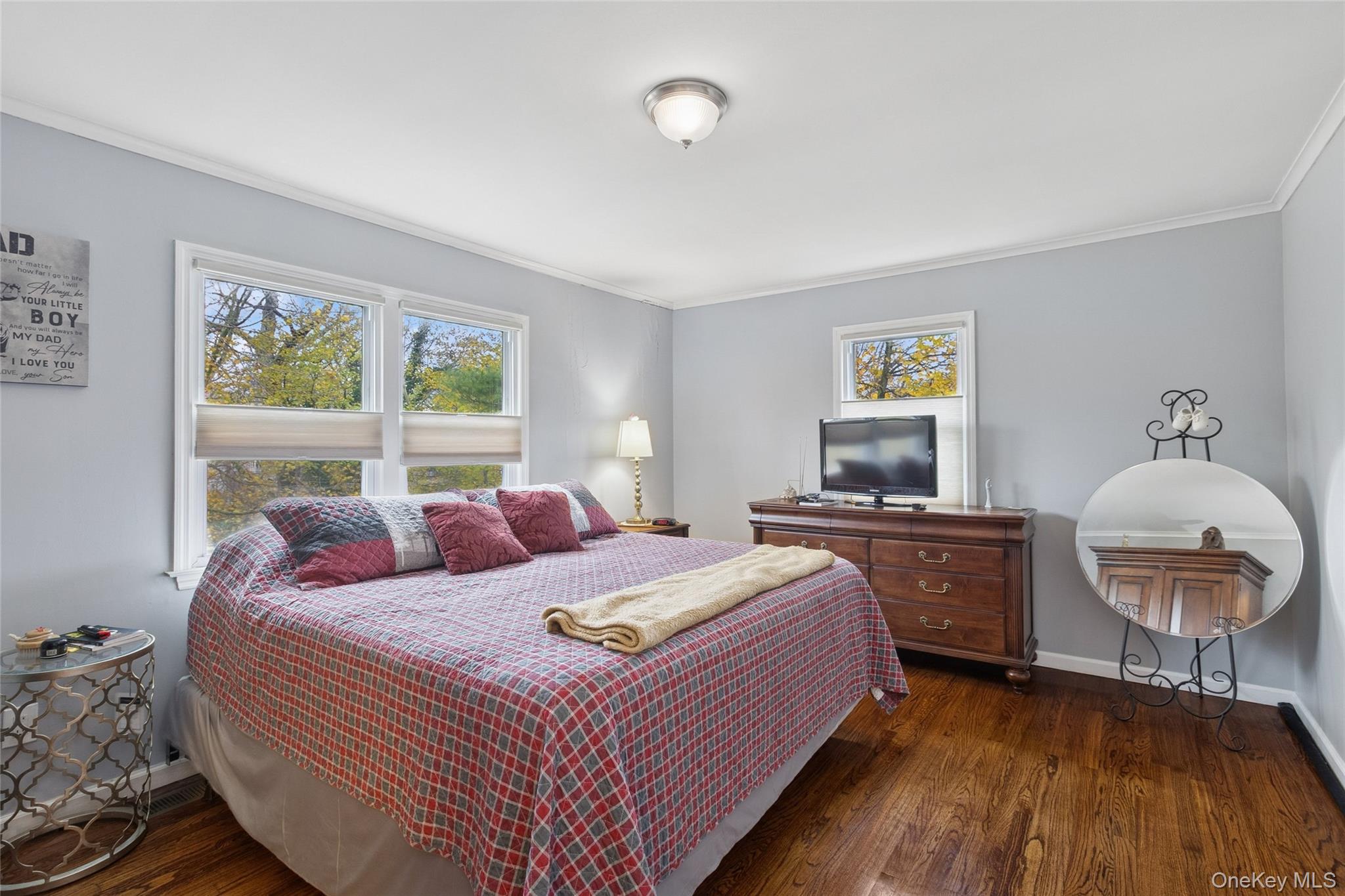 31 Amityville Road Sound Beach, NY 11789 - Photo 26 of 33 a bedroom with a bed and a desk