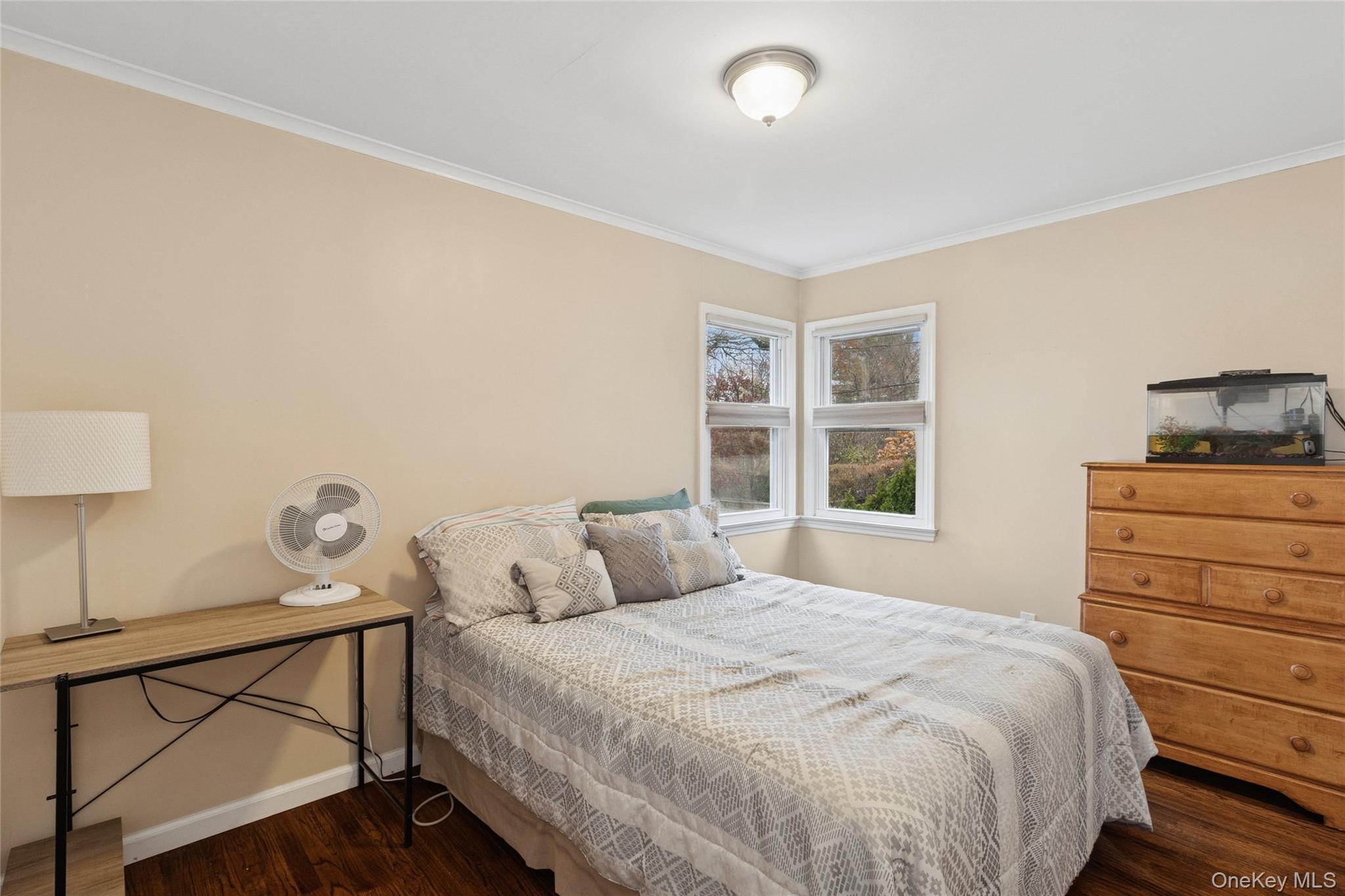 31 Amityville Road Sound Beach, NY 11789 - Photo 28 of 33 a bedroom with a bed and a window