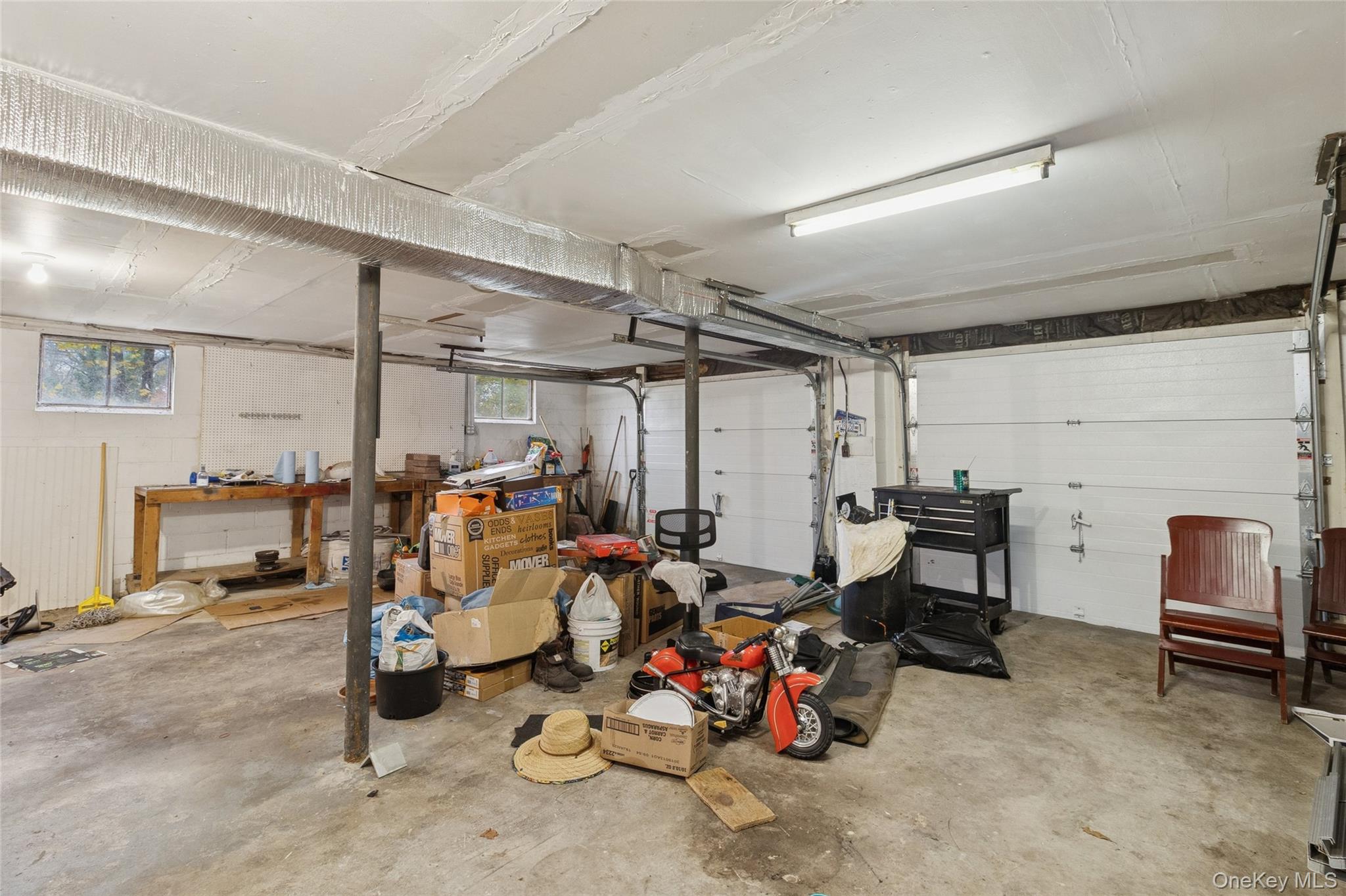 31 Amityville Road Sound Beach, NY 11789 - Photo 32 of 33 a view of a room with gym equipment