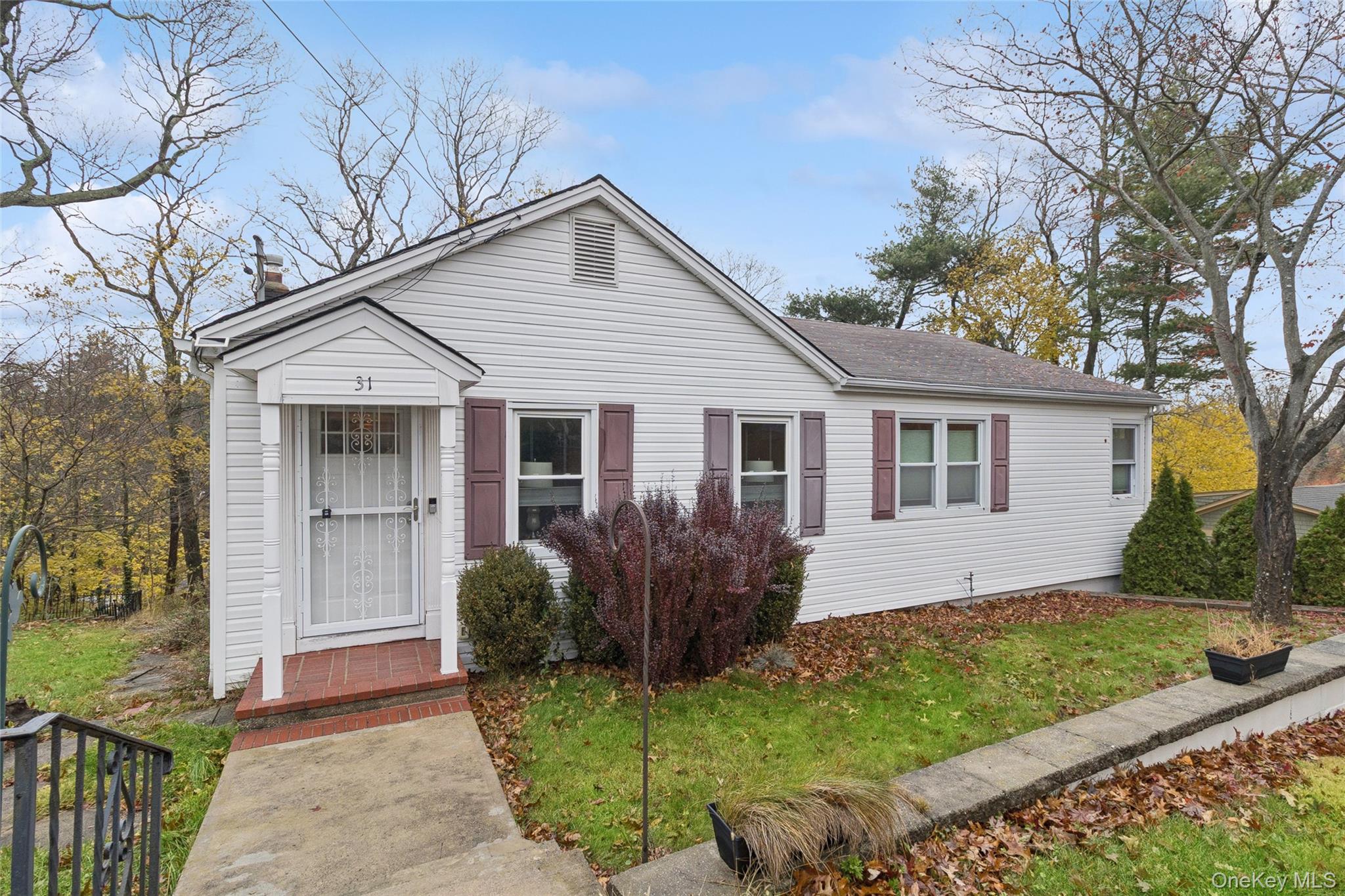 31 Amityville Road Sound Beach, NY 11789 - Photo 6 of 33 a front view of house with yard and green space