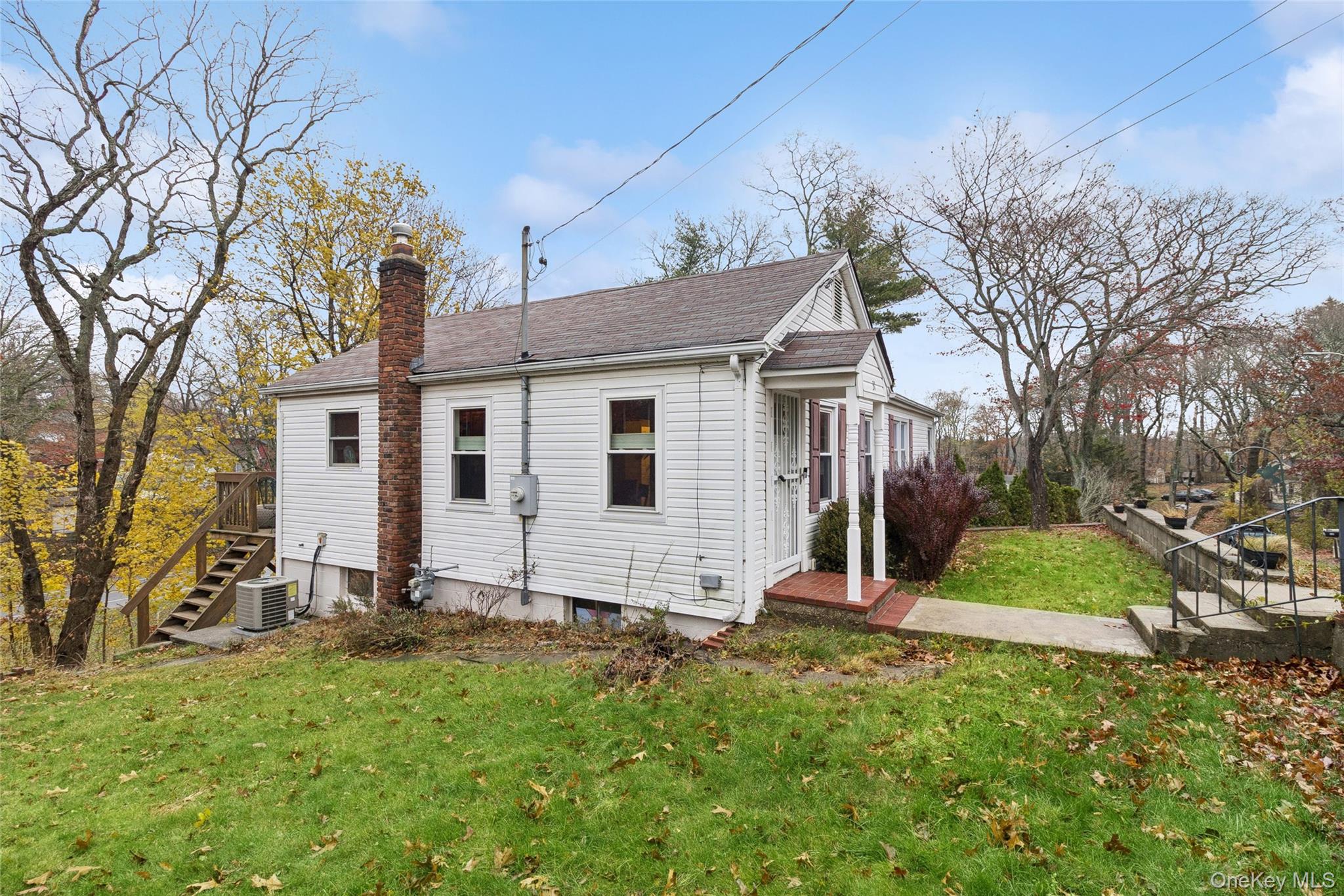 31 Amityville Road Sound Beach, NY 11789 - Photo 7 of 33 a view of backyard of house