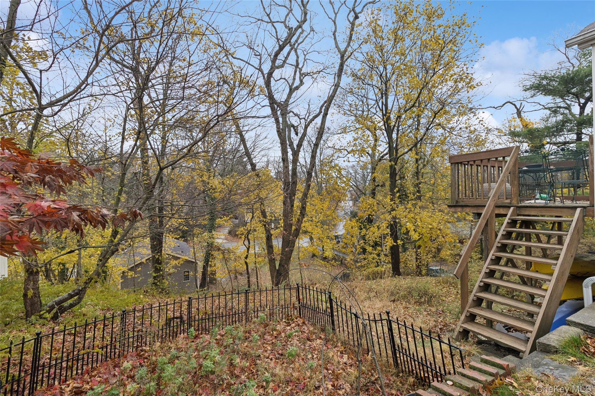 31 Amityville Road Sound Beach, NY 11789 - Photo 8 of 33 a view of a brick house with large trees