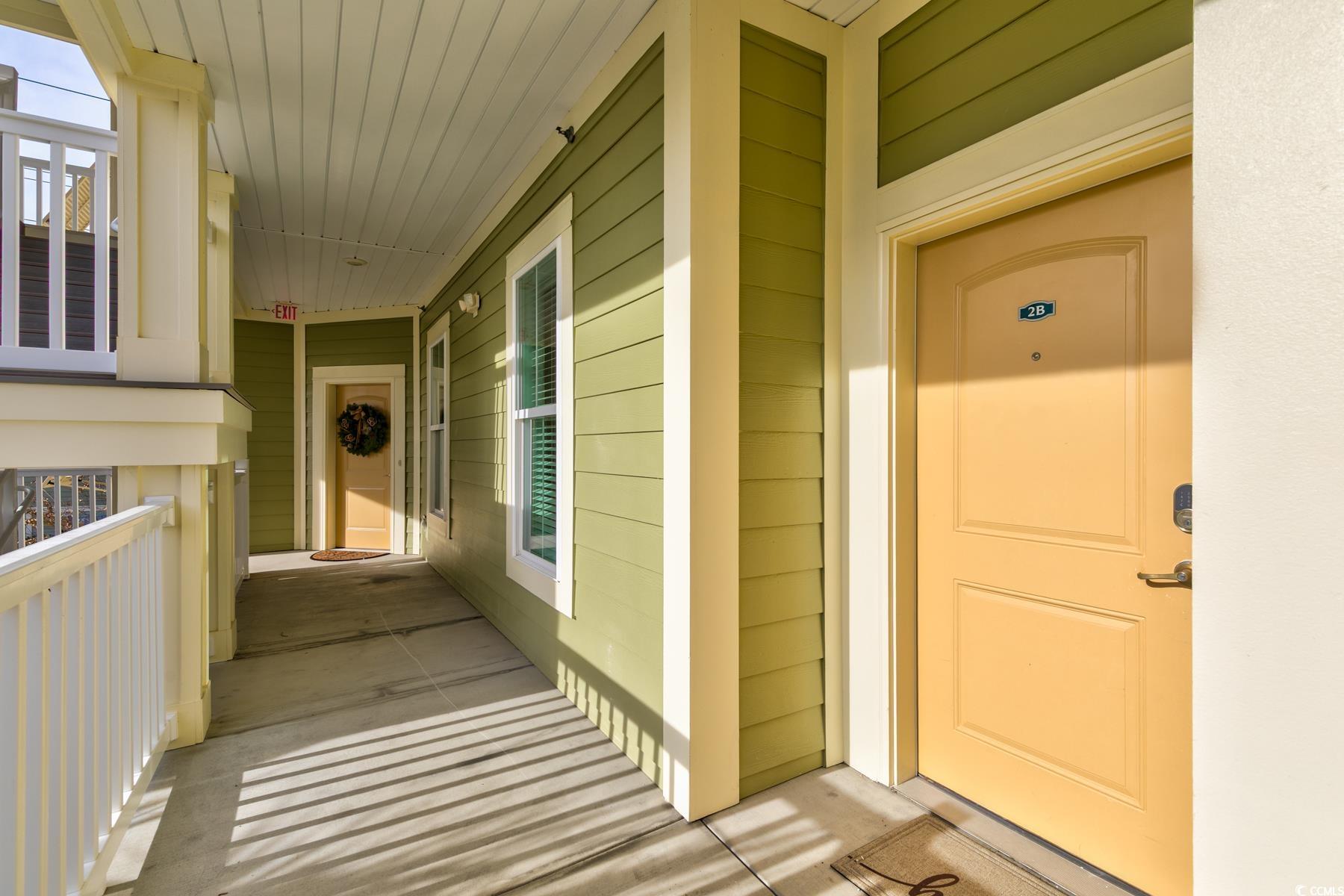 130 Puffin Drive, Unit 2B Pawleys Island, SC 29585 - Photo 2 of 34 View of exterior entry