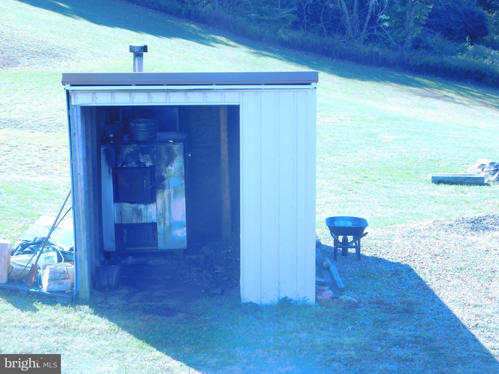 8475 Westernport Road Swanton, MD 21561 - Photo 40 of 45 optional heating- outdoor furnace - wood or coal
