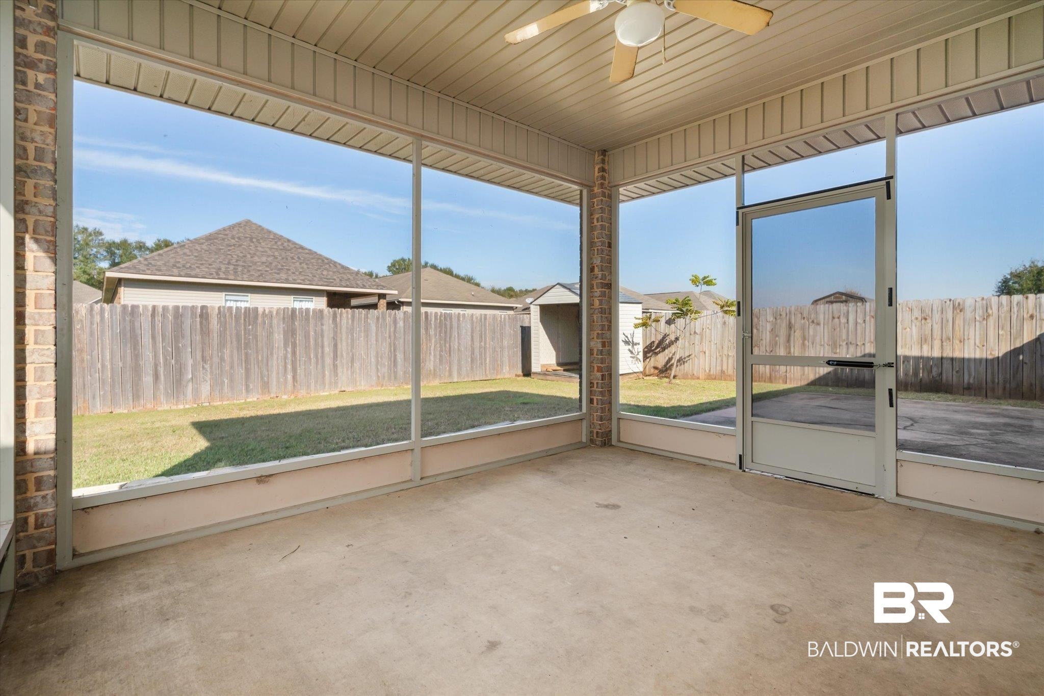 10251 Fionn Loop Daphne, AL 36526 - Photo 19 of 28 Unfurnished sunroom featuring ceiling fan, a healthy amount of sunlight, and wooden ceiling