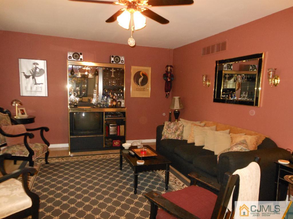 421 Ridge Road Dayton, NJ 08810 - Photo 4 of 17 a living room with furniture