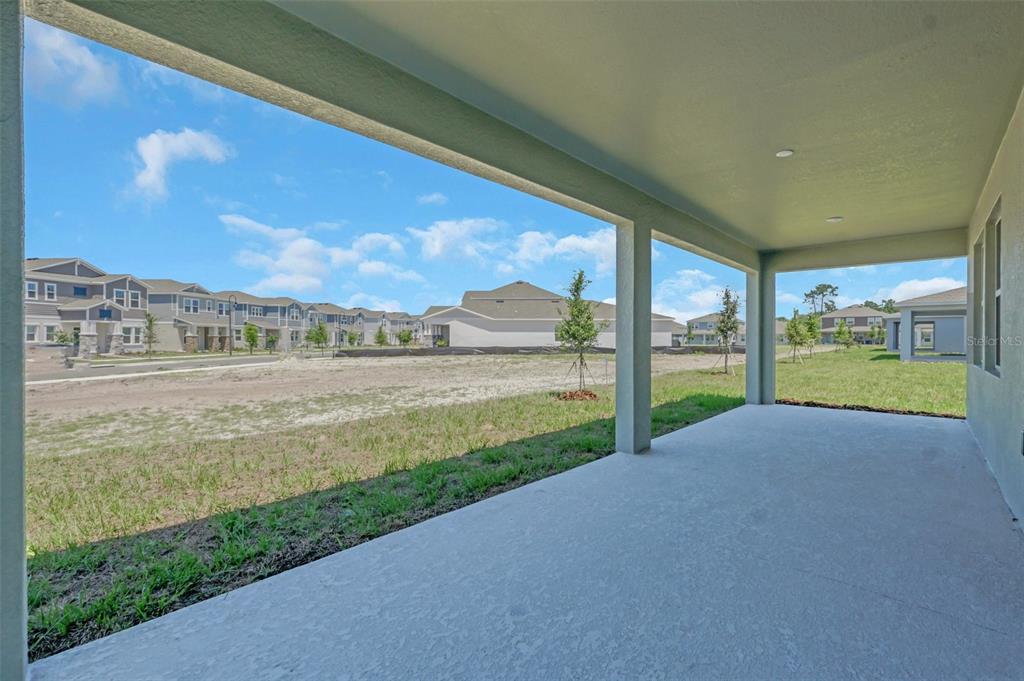 5768 Stephens Road St. Cloud, FL 34771 - Photo 39 of 50 a view of swimming pool with outdoor seating