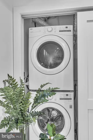 a view of a balcony with furniture