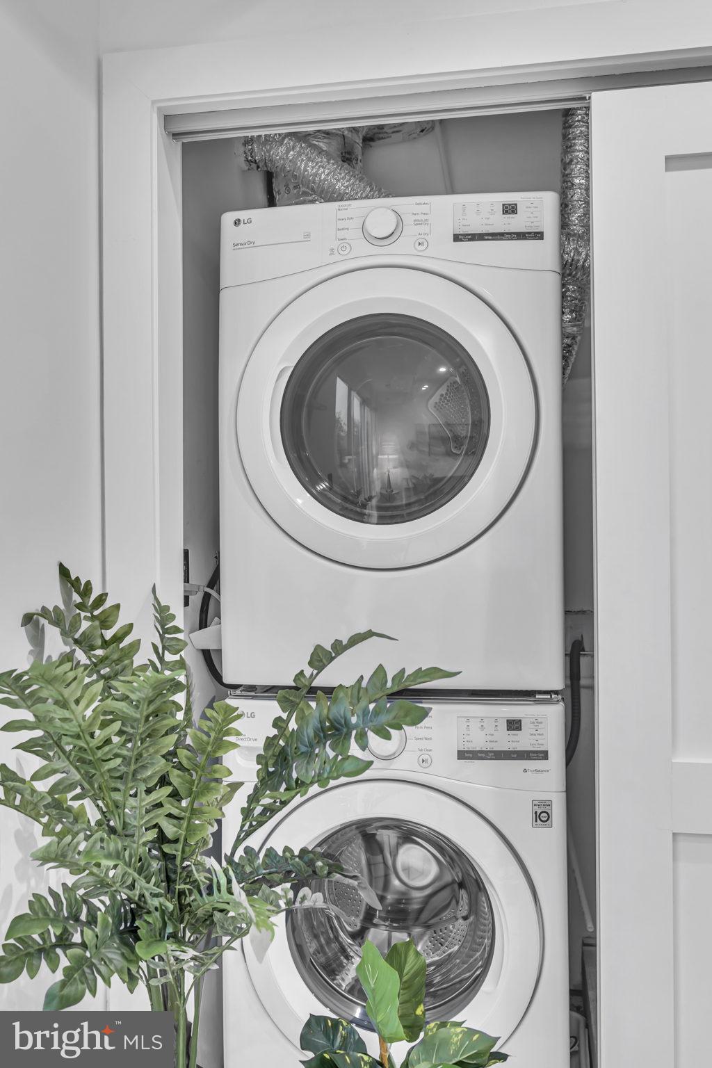 1103 Fern Street Northwest, Unit 301 Washington, DC 20012 - Photo 38 of 57 a utility room with dryer and washer