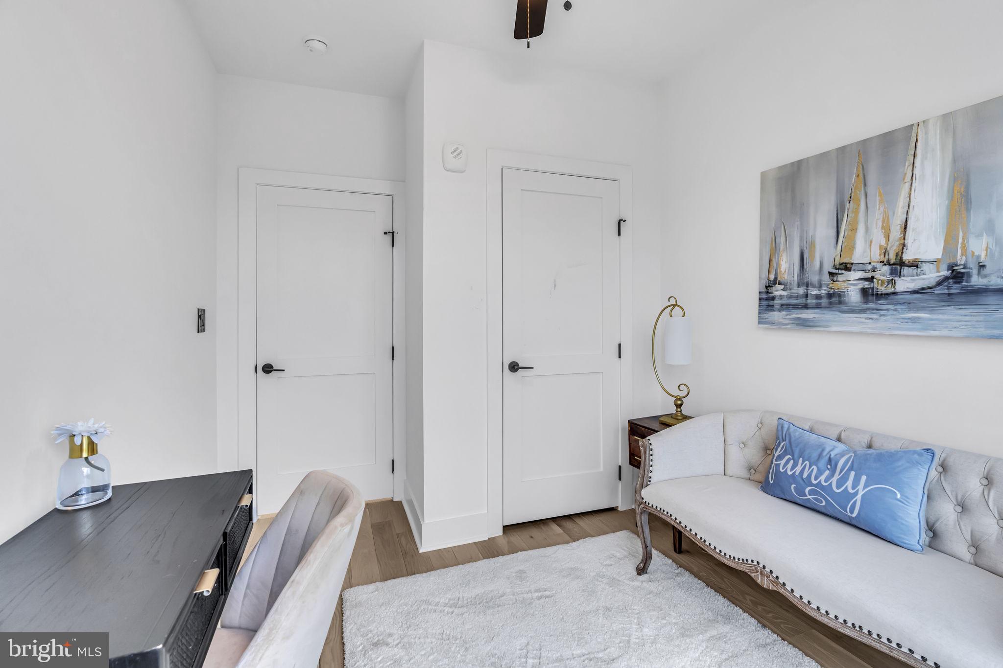 1103 Fern Street Northwest, Unit 301 Washington, DC 20012 - Photo 40 of 57 a living room with furniture