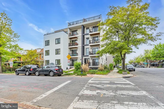 a car parked in front of a house