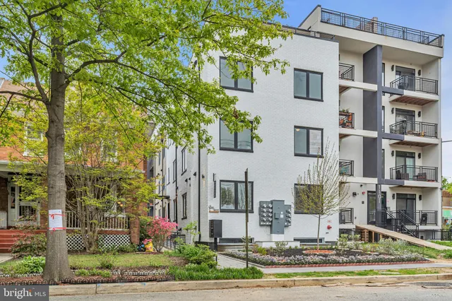 a car parked in front of a house