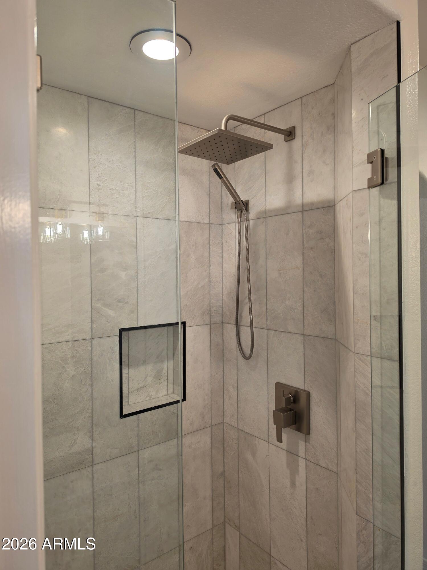 7601 East Indian Bend Road, Unit 1017 Scottsdale, AZ 85250 - Photo 18 of 49 a bathroom with a shower