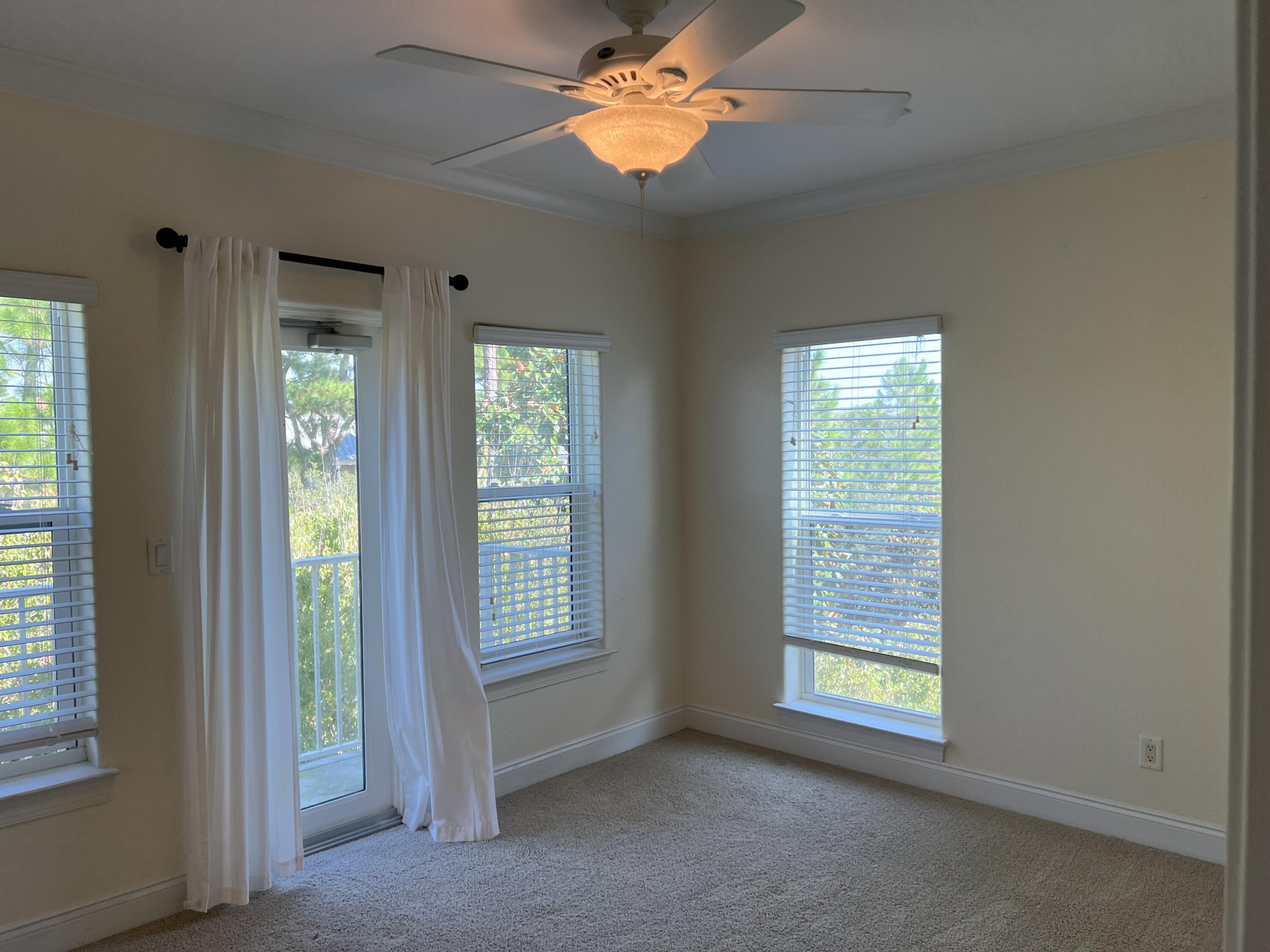 118 Spires Lane, Unit 5B Santa Rosa Beach, FL 32459 - Photo 23 of 28 a view of an empty room with a window
