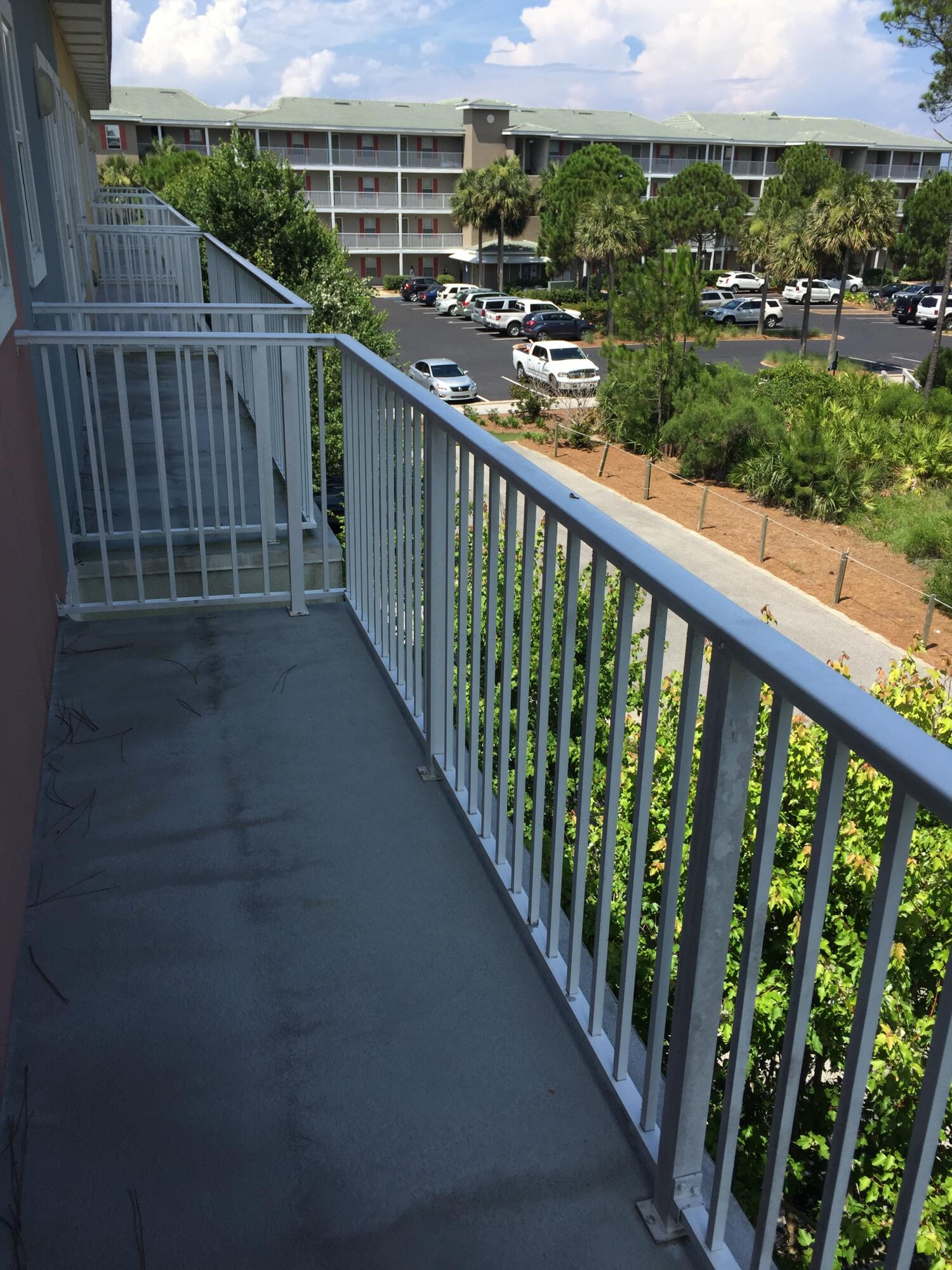 118 Spires Lane, Unit 5B Santa Rosa Beach, FL 32459 - Photo 27 of 28 a view of a balcony with city view