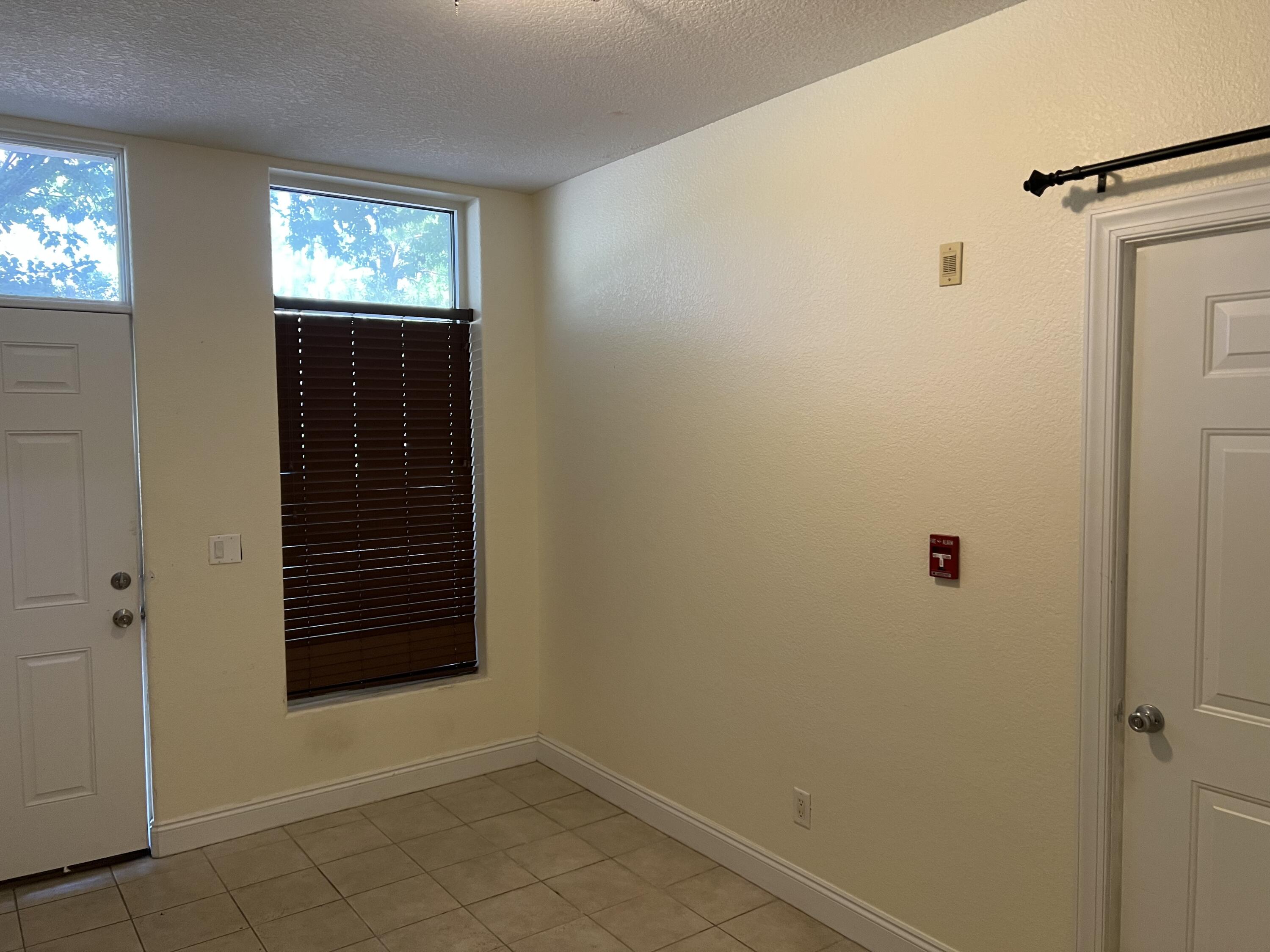 118 Spires Lane, Unit 5B Santa Rosa Beach, FL 32459 - Photo 3 of 28 a view of empty room with window and hallway
