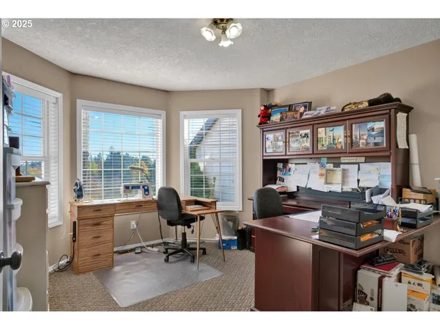 a room with furniture and a flat screen tv