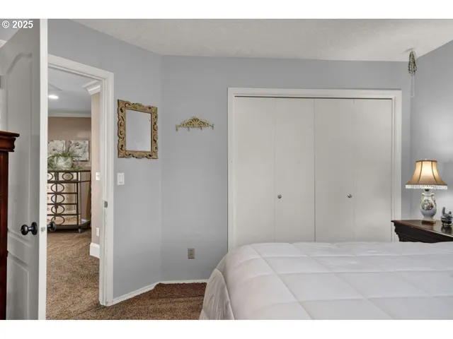 a view of a porch with chairs and backyard