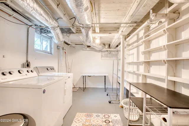 a view of a bathroom with wooden floor