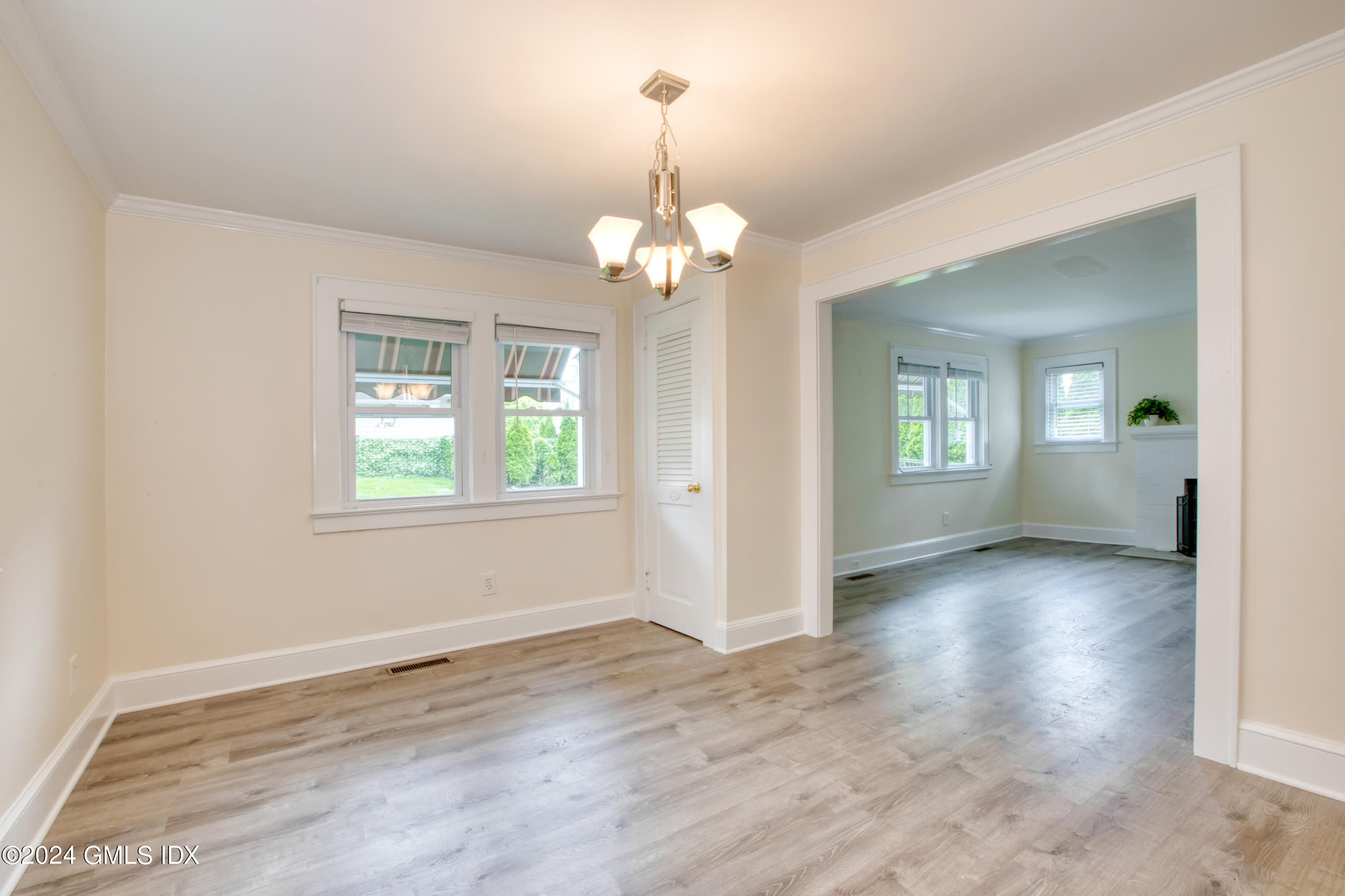4 R Highview Avenue Old Greenwich, CT 06870 - Photo 6 of 21 wooden floor in an empty room with a window