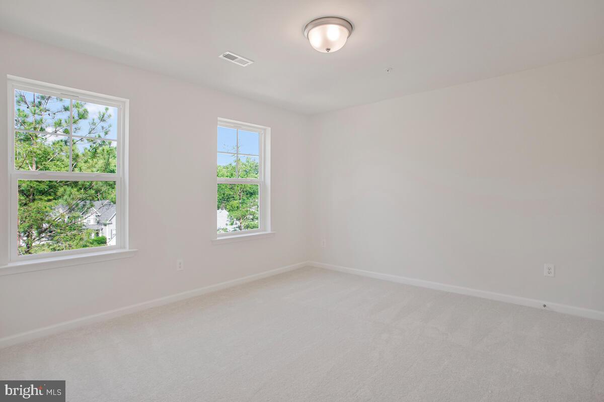721 Nollmeyer Road Middle River, MD 21220 - Photo 21 of 33 an empty room with windows