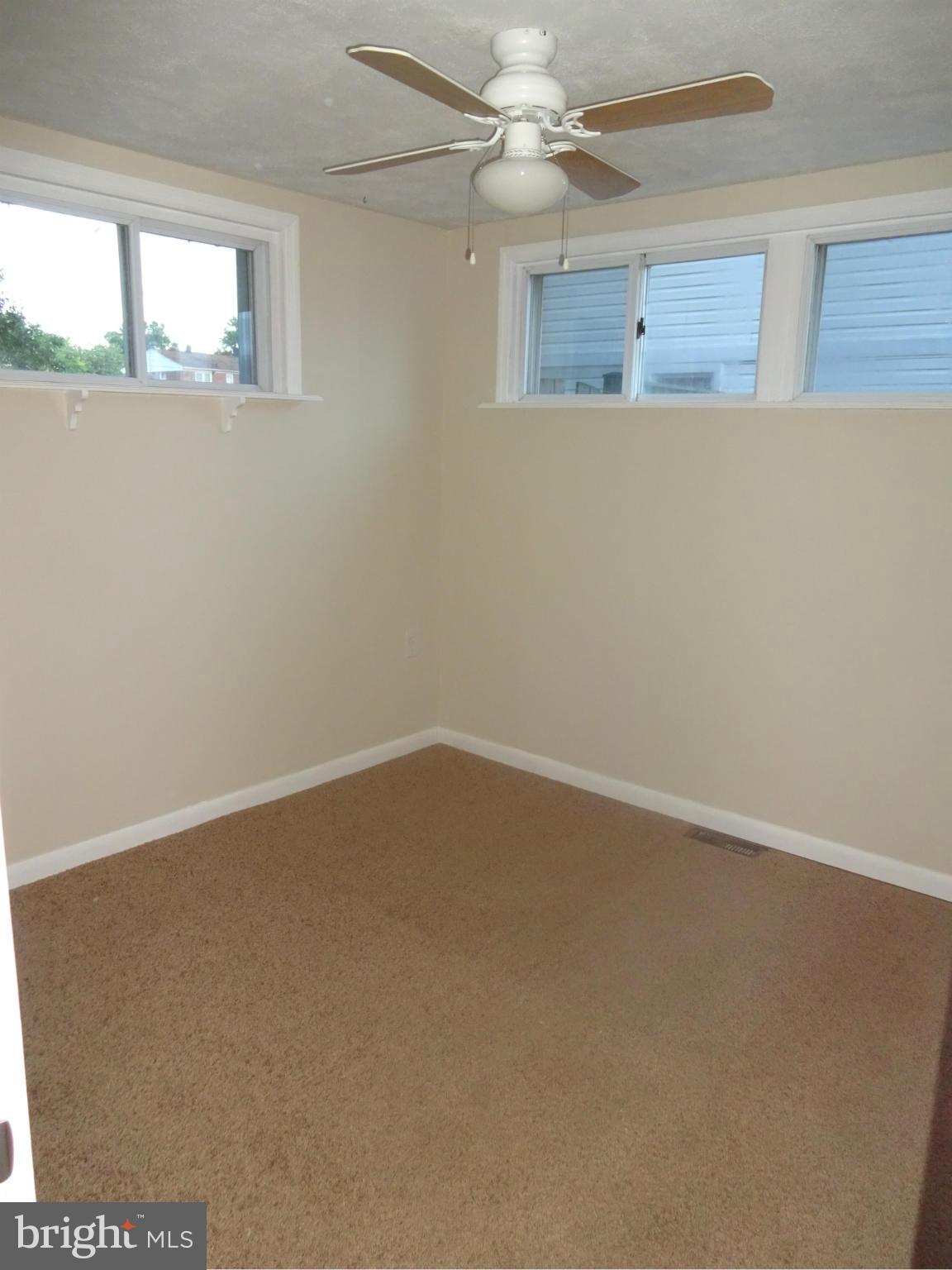 1631 Williams Avenue Baltimore, MD 21221 - Photo 12 of 28 Bedroom 3 on the Main Level w/ Ceiling Fan