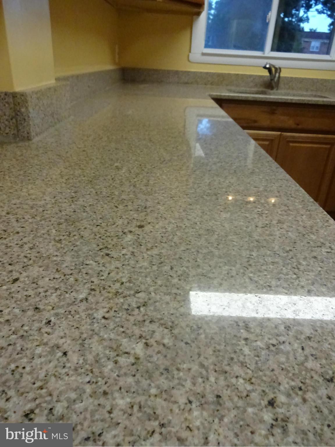 1631 Williams Avenue Baltimore, MD 21221 - Photo 7 of 28 Beautiful Granite Counters in the Kitchen