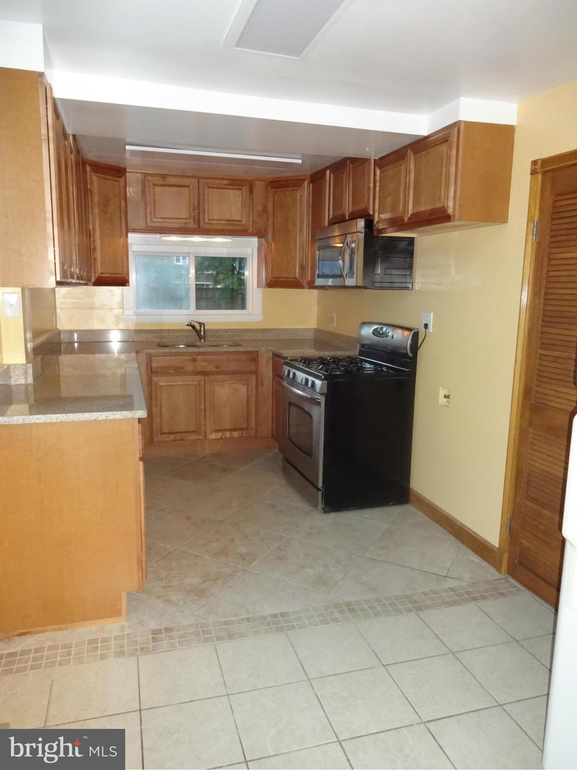 1631 Williams Avenue Baltimore, MD 21221 - Photo 8 of 28 Kitchen Offers the Appliances