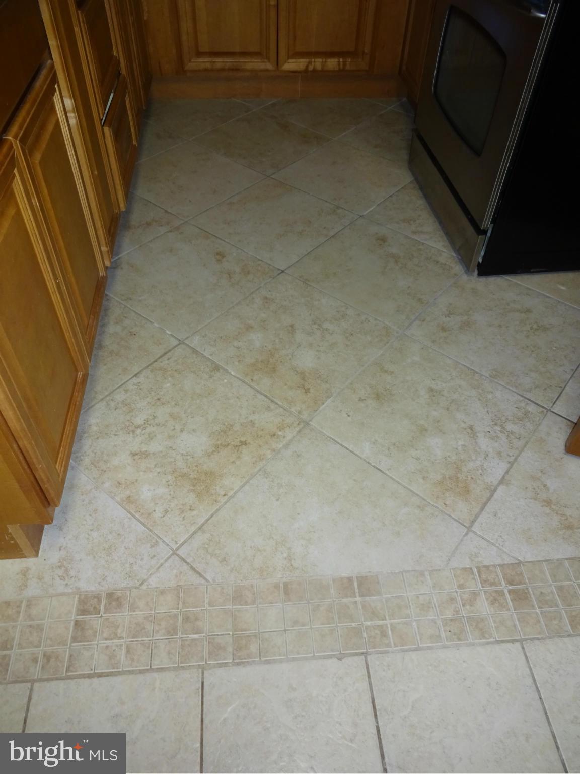 1631 Williams Avenue Baltimore, MD 21221 - Photo 10 of 28 Ceramic Tile Floor in the Kitchen