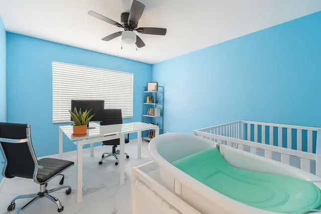 a workspace with furniture and a window