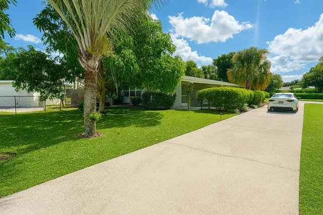 a view of a backyard with a garden