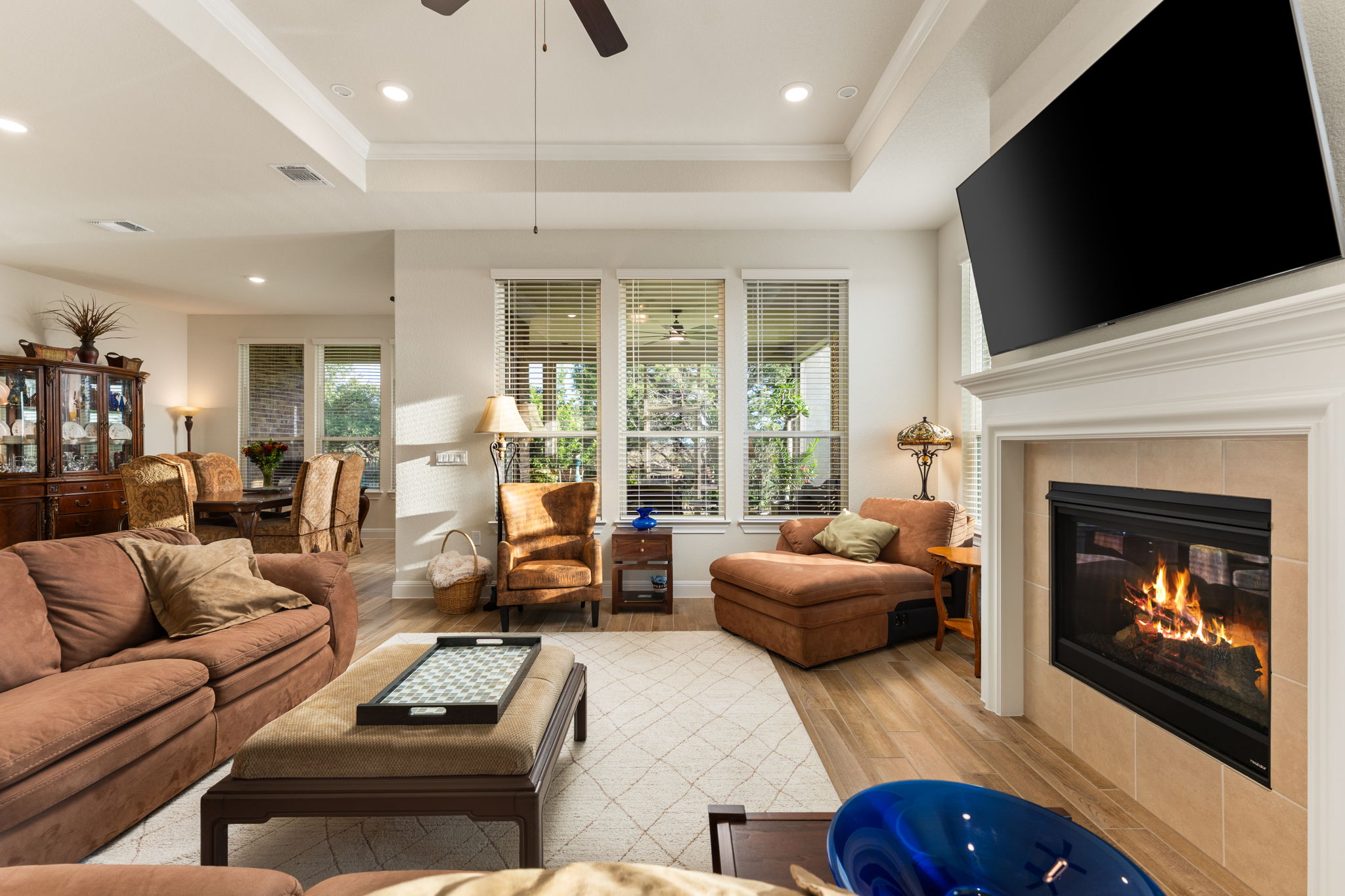 112 Telegraph Lane Georgetown, TX 78633 - Photo 11 of 35 There is room for tons of seating, and the numerous windows make the room bright.